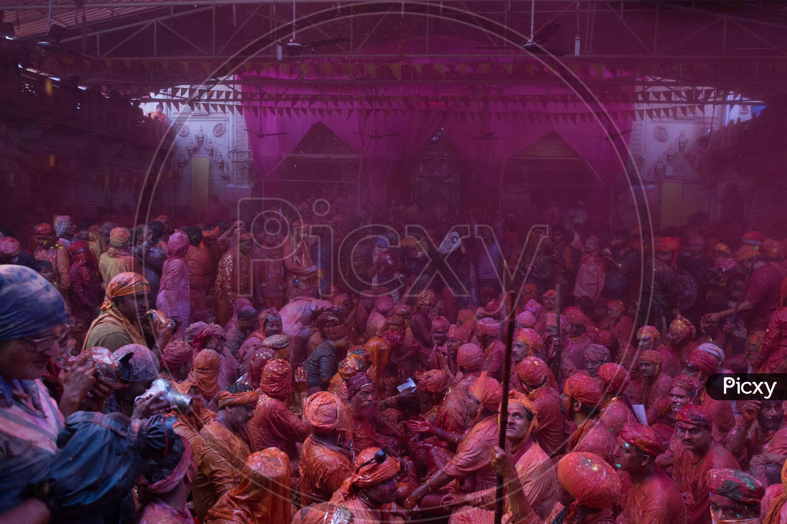 Local People In Barsana Celebrating The  Lathmar Holi Festival