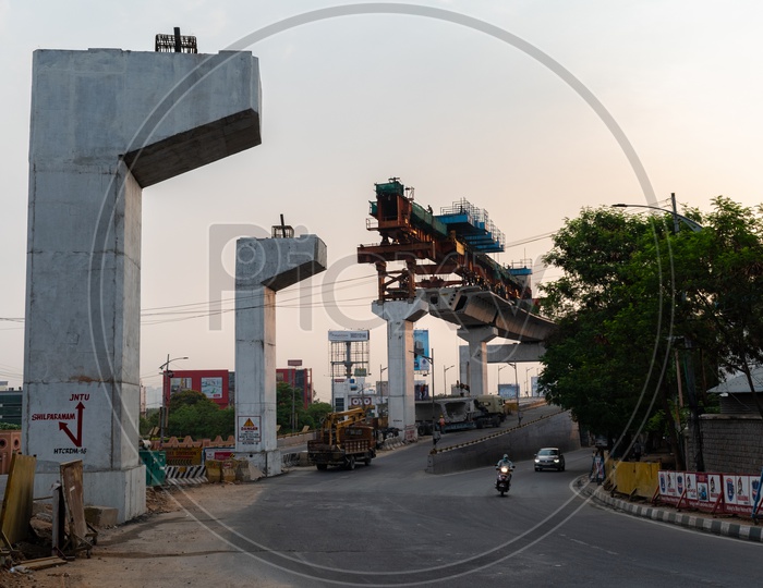 Hyderabad Metro rail construction over Hitech city flyover at Cyber Towers connecting Hitech city station to Raidurg station.
