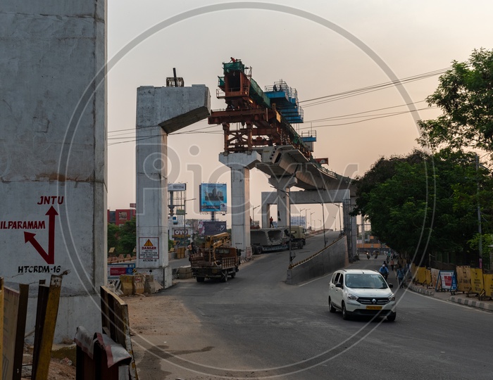 Hyderabad Metro rail construction over Hitech city flyover at Cyber Towers connecting Hitech city station to Raidurg station.