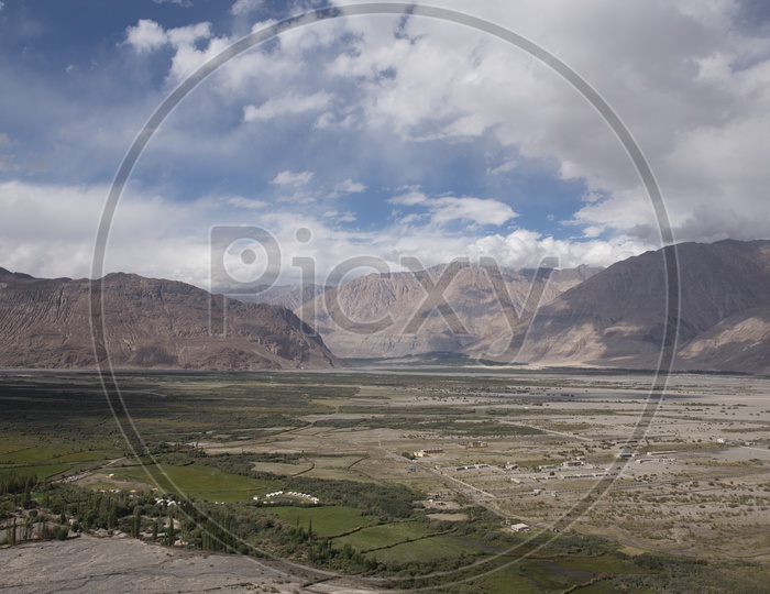 Landscape of beautiful Mountains of Leh with Huge clouds