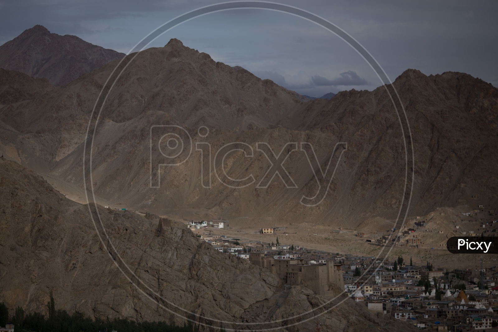 Mountains of leh with houses in foreground