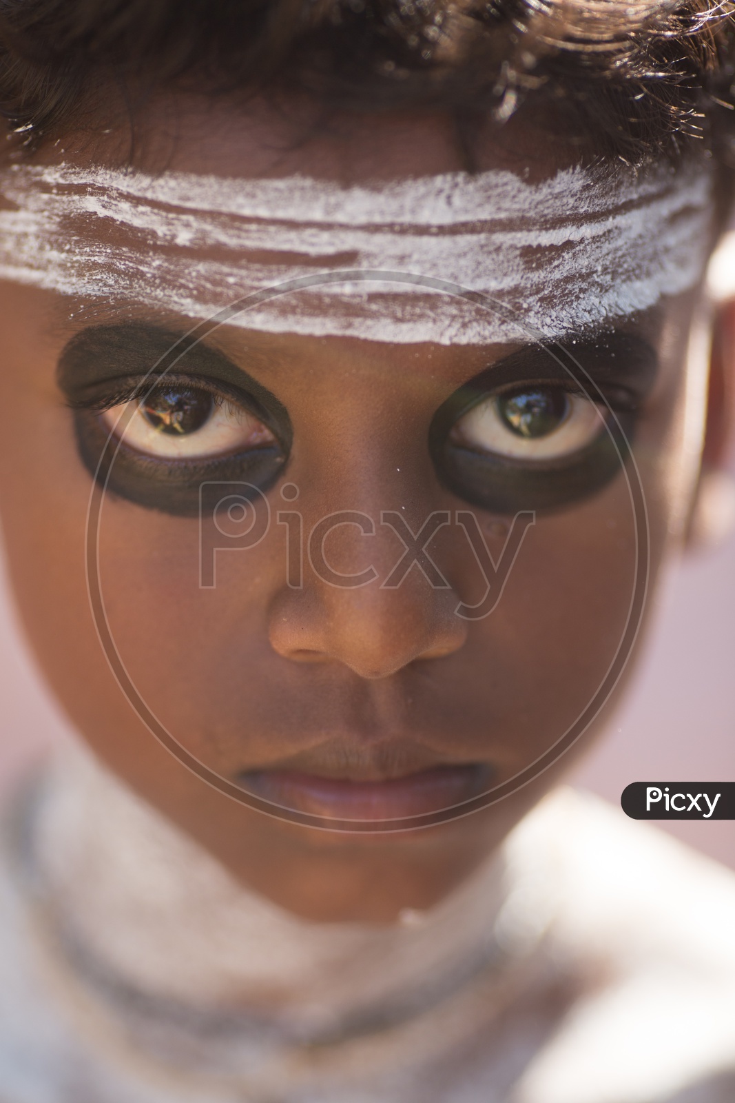 Portrait Of a Young Boy Artist For Theyyam Performance