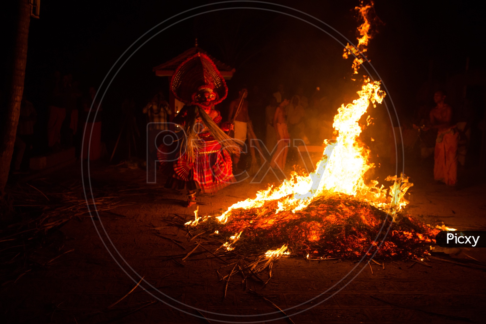Devotees Making A Camp Fire As A Ritual  At Goddess Bagavathi  Amman Temples During Theyyam Performances