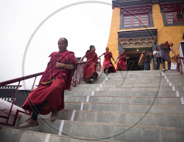 Buddhist Monks coming out from the monastery