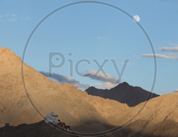 Beautiful Mountains of Leh with moon in the sky