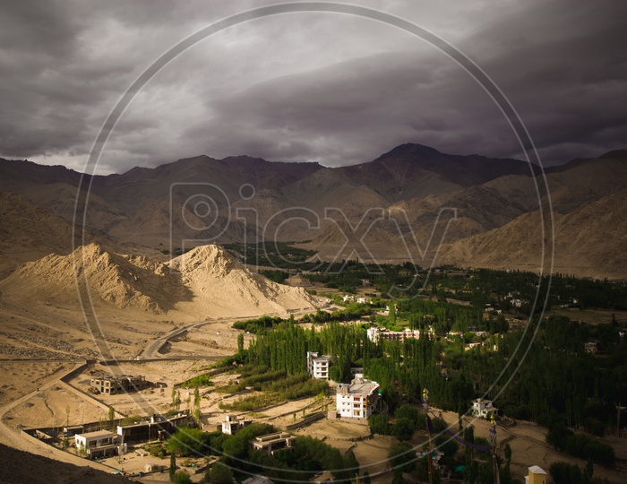 Mountains of Leh with houses in the foreground