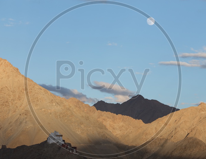 Beautiful Mountains of Leh with moon in the sky