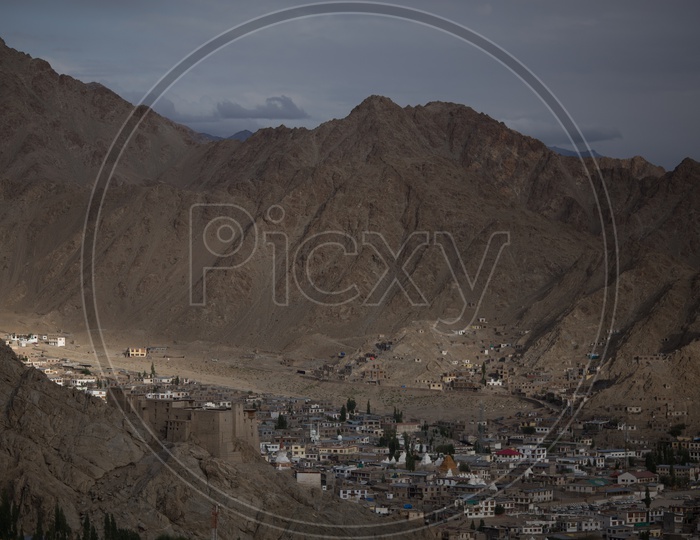 Mountains of leh with houses in foreground