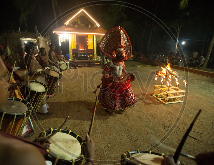 Theyyam Artists Performing  At Bhagawathi Amman Temples As a a Ritual In Theyyam Celebrations