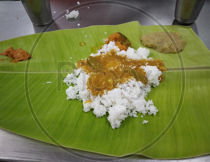 South Indian Styled Lunch Or Dinner Or Food Served On Banana Leaf