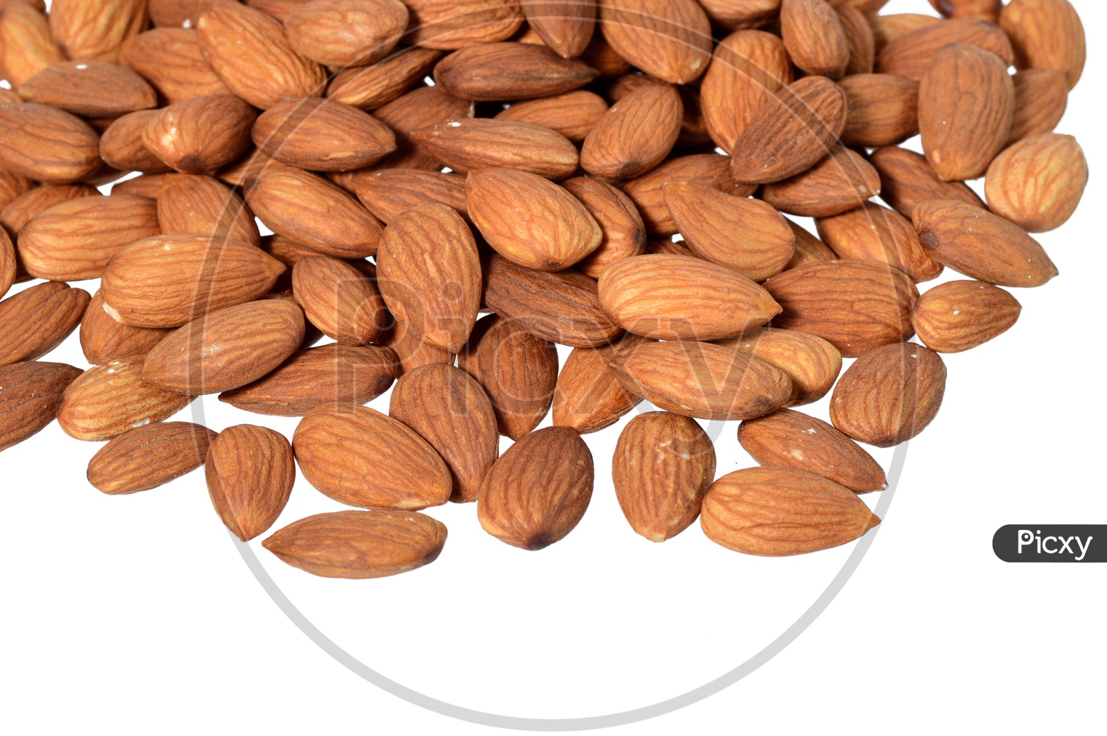 Almonds Or Badam Nuts Pile On an Isolated White Background
