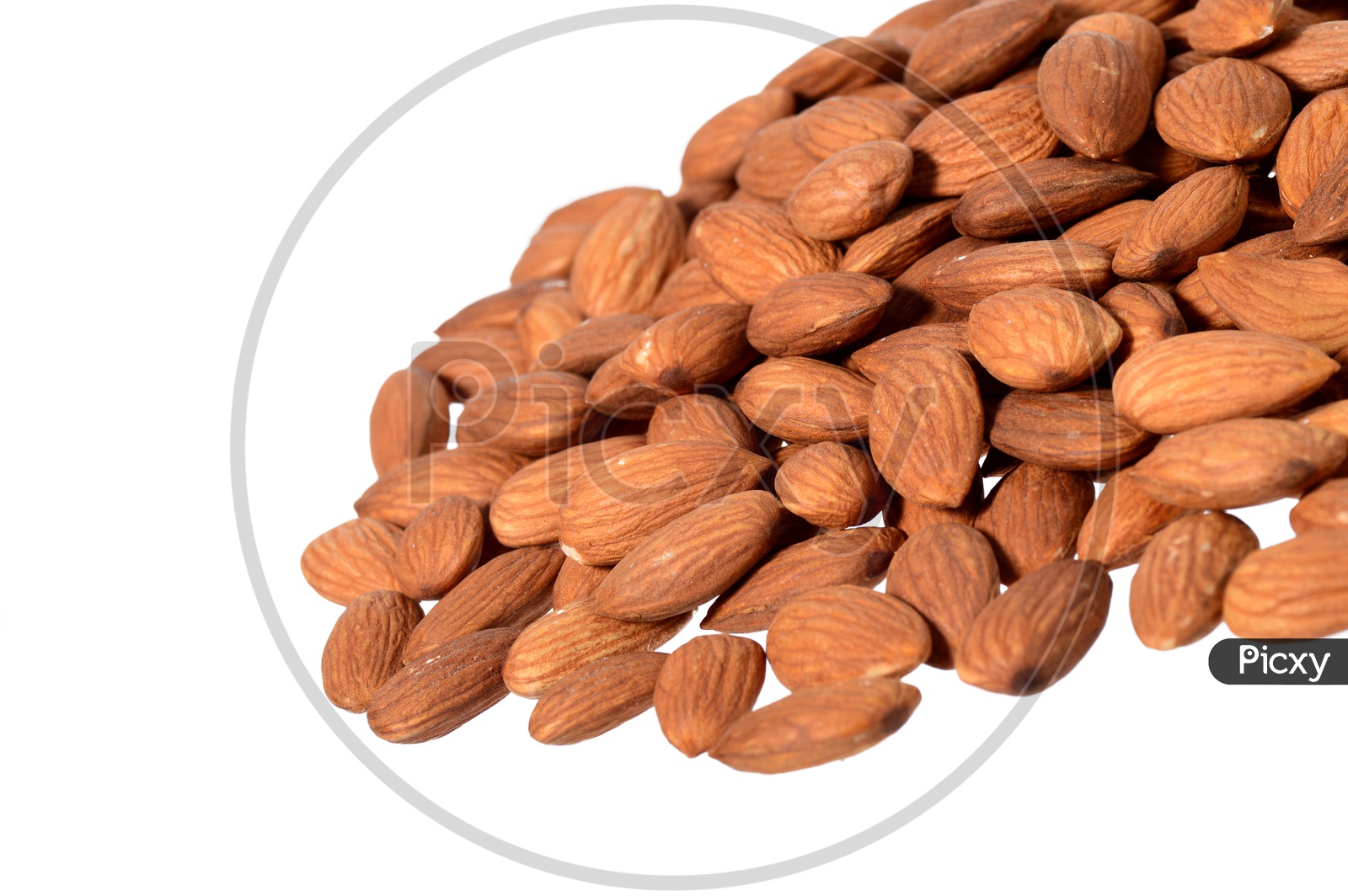 Image of Almonds Or Badam Nuts Pile On an Isolated White Background ...