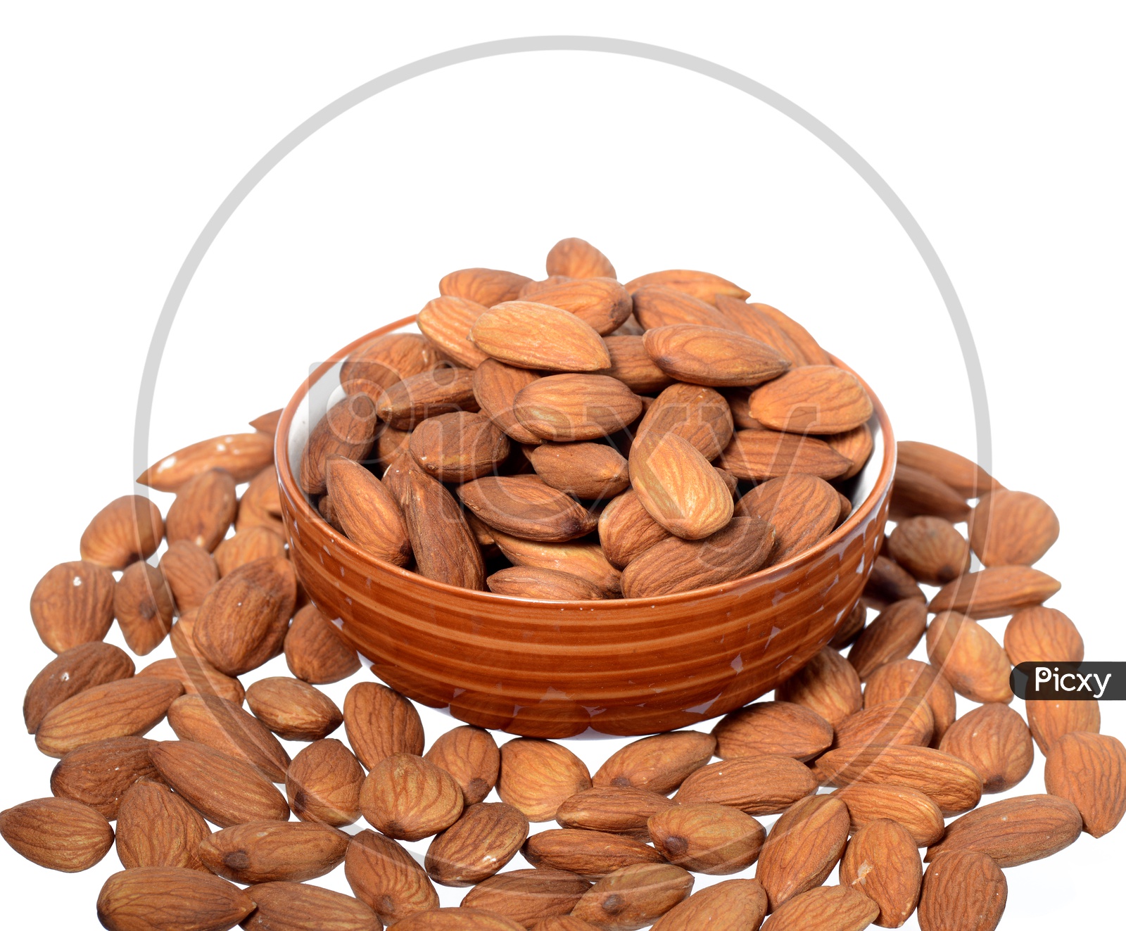 Almonds Or Badam Nuts Heap In a Bowl On an Isolated White Background