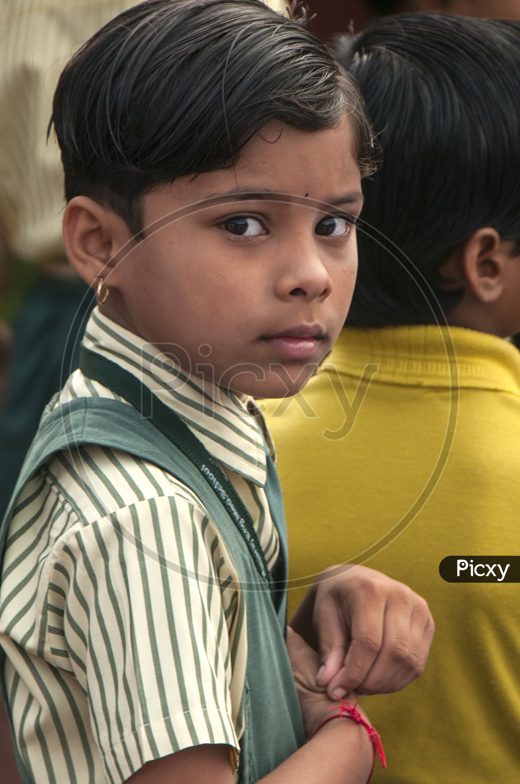 Image of Indian boy with silky hair making an expression-MS427216-Picxy