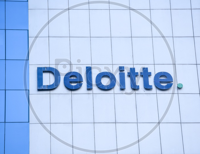Deloitte  , Name Board On Corporate Building
