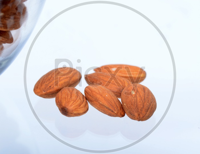 Almonds Or Badam Nuts On the Isolated White Background