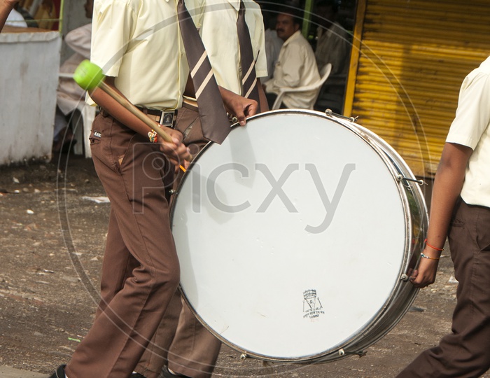 School  Students With A School Band or Big Drum in Independence Day March