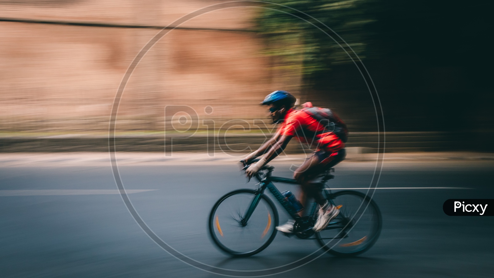 Pan shot of a cyclist on the roads of Pune
