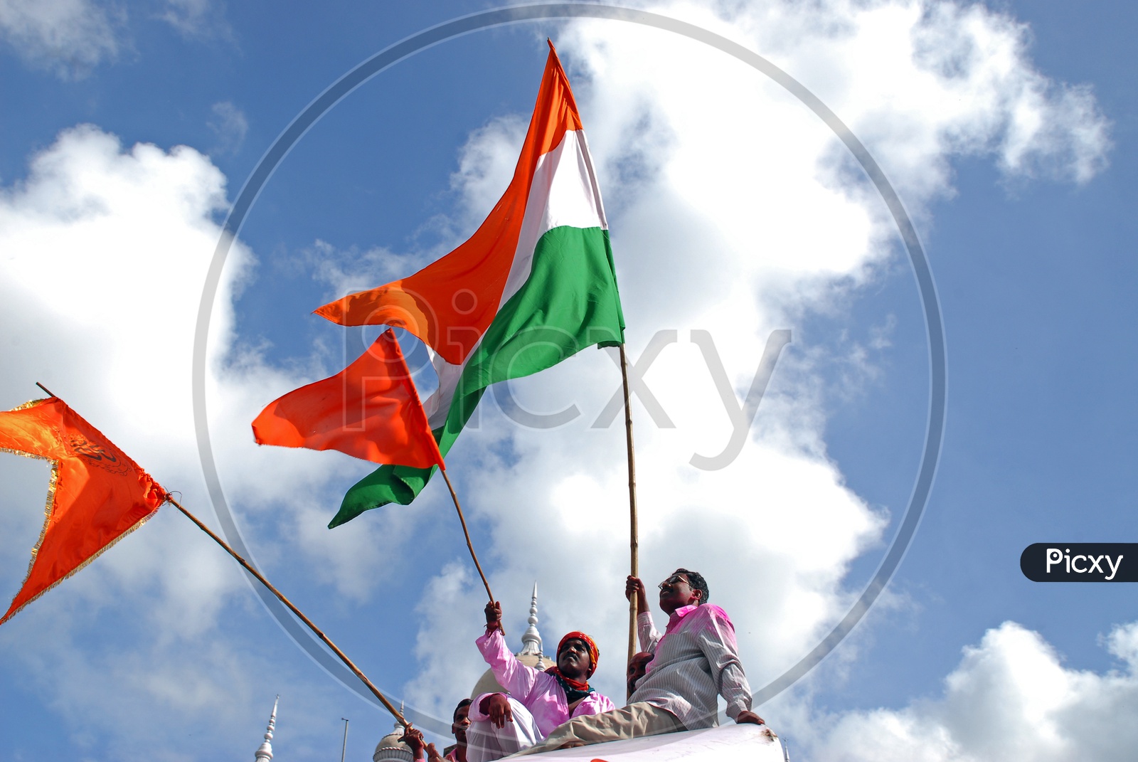 Indian men holding Indian flags