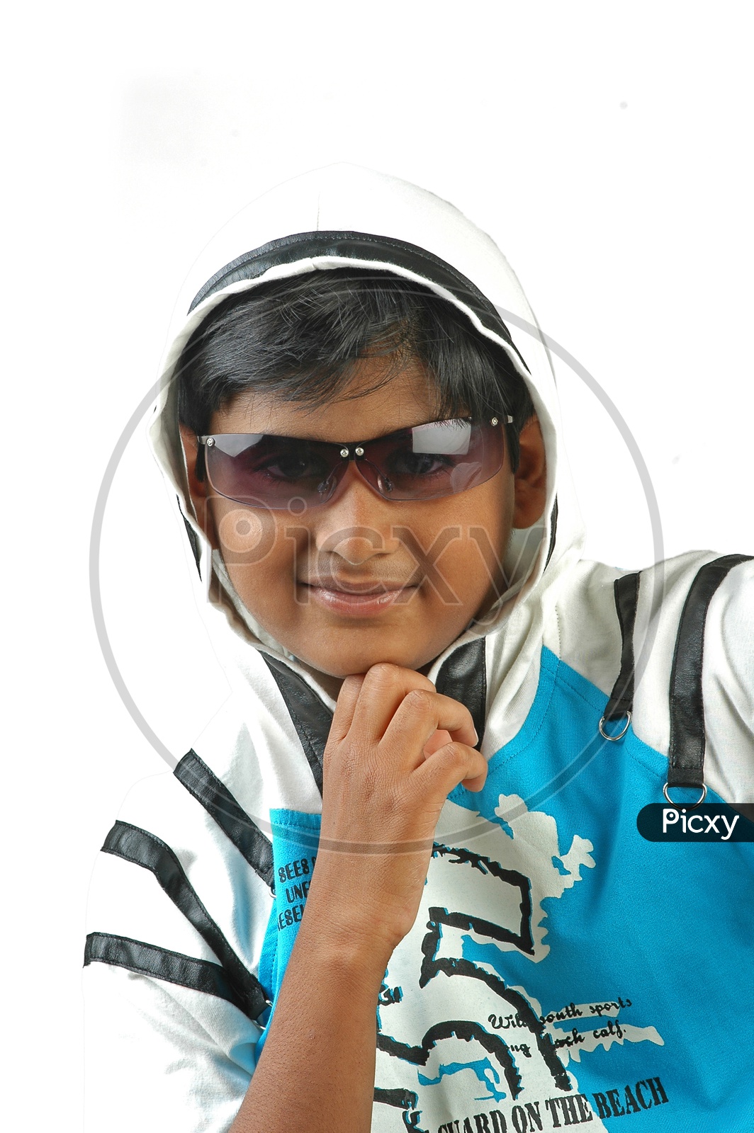 Indian boy wearing hoodie and sunglasses