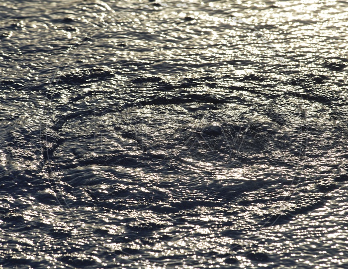 Texture Of Water Surface With Refracting Light On Water Surface