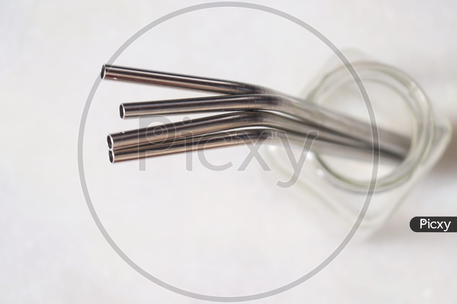 Stainless steel straws in a glass jar