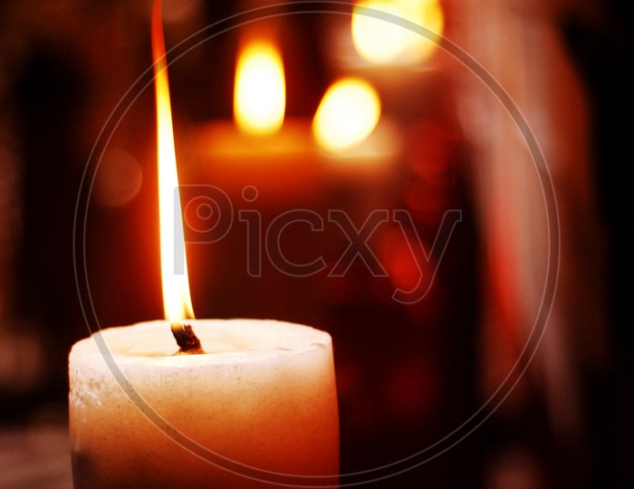 Wax Candles Lighted In Dark