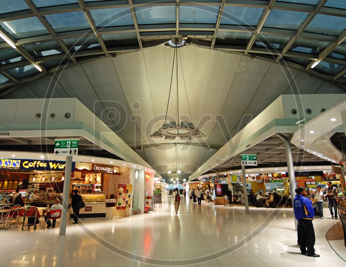 Passengers At Food Stalls Or restaurants In Airport
