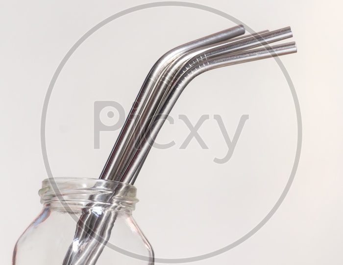 Stainless steel straws in a glass jar