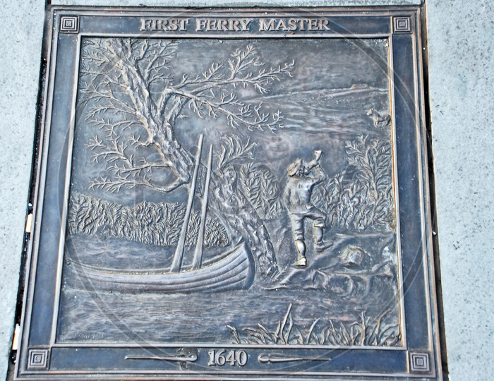Illustration of first ferry master (1640) embossed on a metal surface