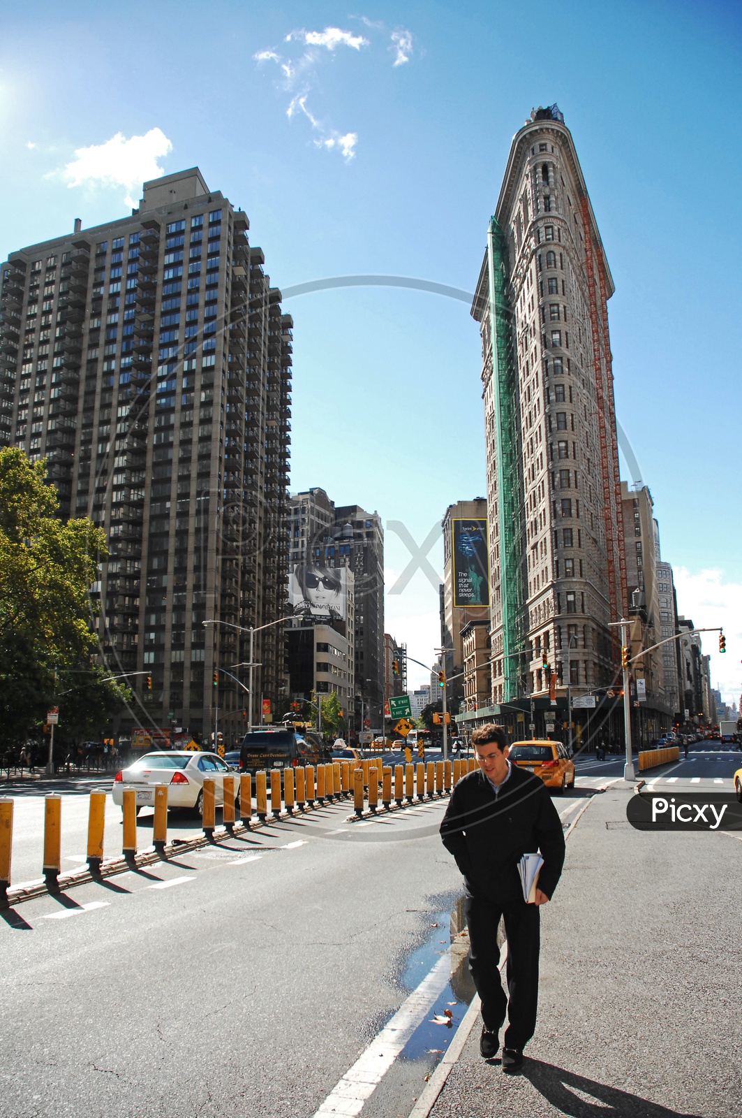 A man walking on the road in New York