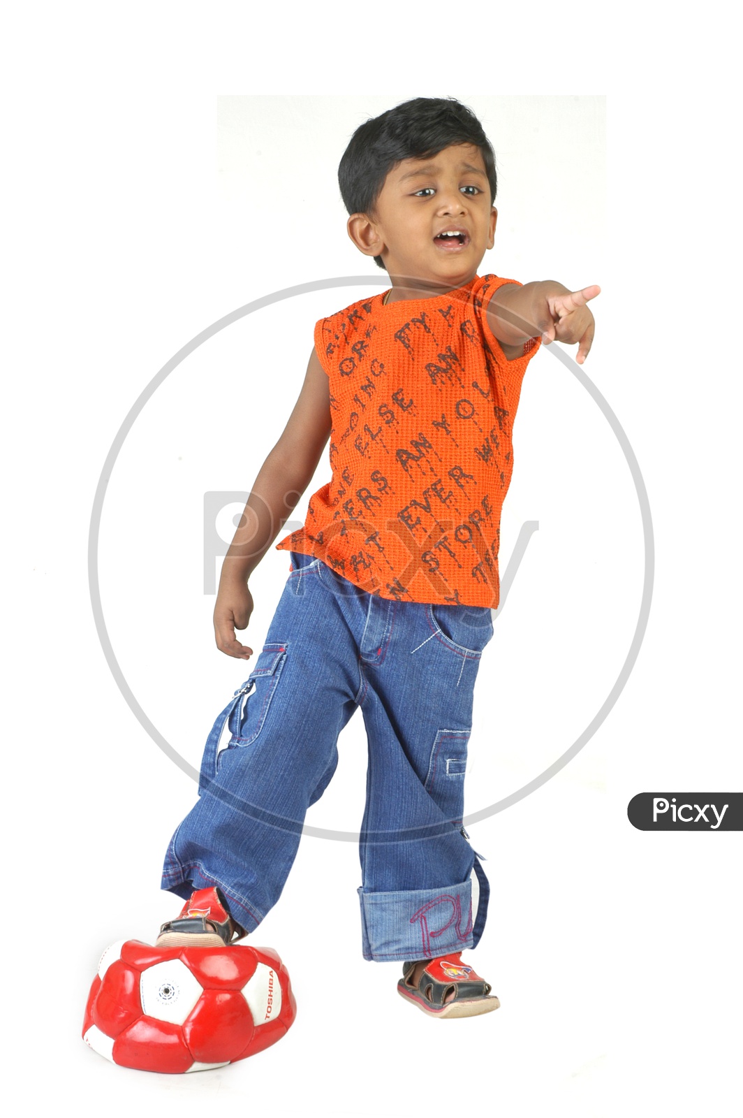 Indian boy wearing a sleeveless shirt