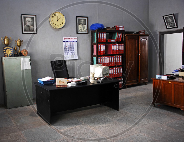 Government office room With Table And Book Shelf