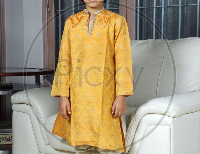 Indian boy wearing kurta pyjama and sunglasses