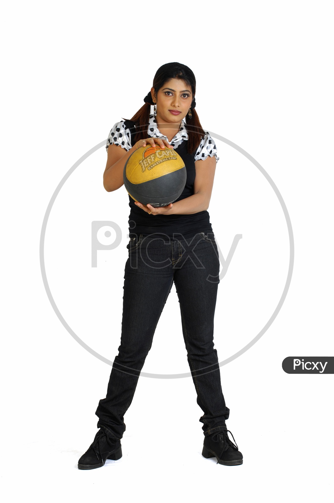 Indian Woman holding a throw ball
