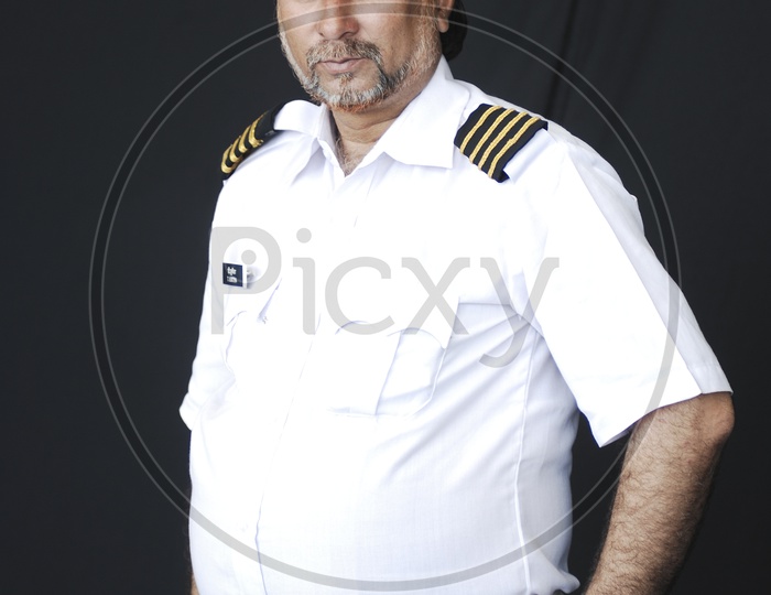 A Man dressed up in a Navy Costume