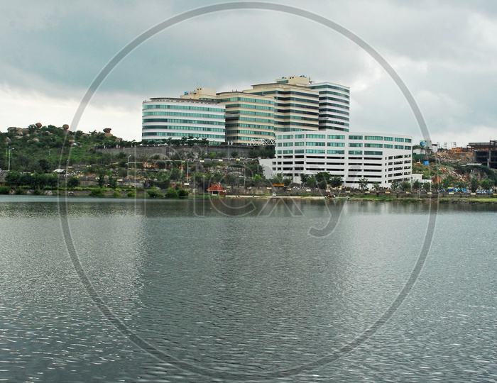High Rise Corporate Buildings Beside A Lake