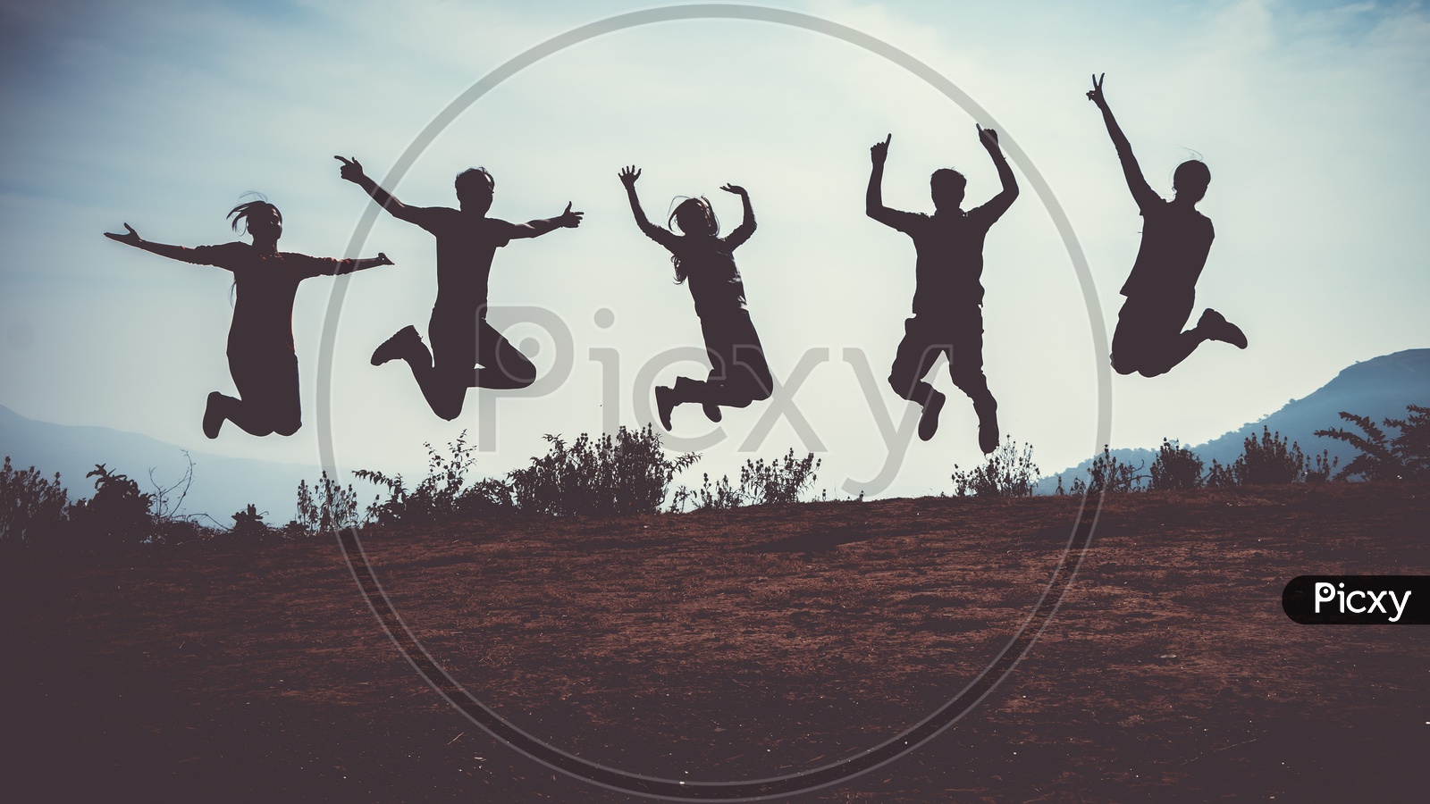 Friends jumping at once in air