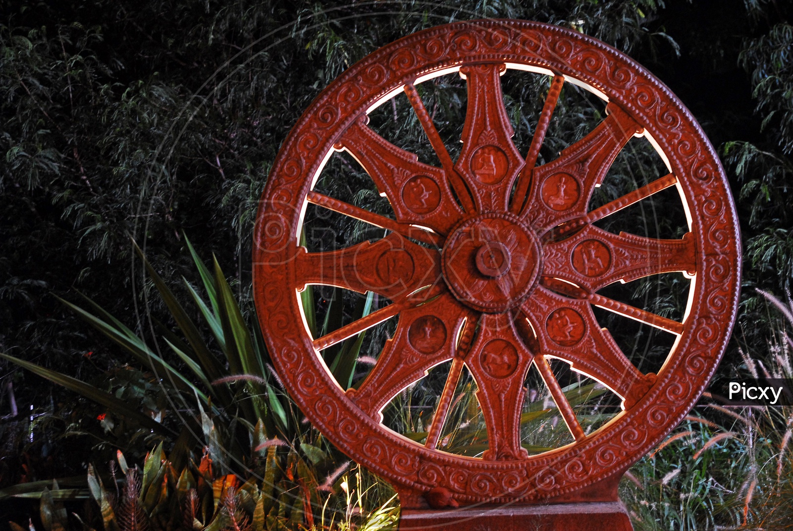 Cart Wheel Model in a House Garden