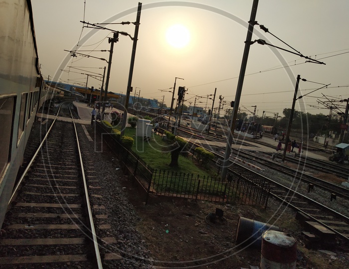 Indian Railways Train Platform And Track With Electric Poles