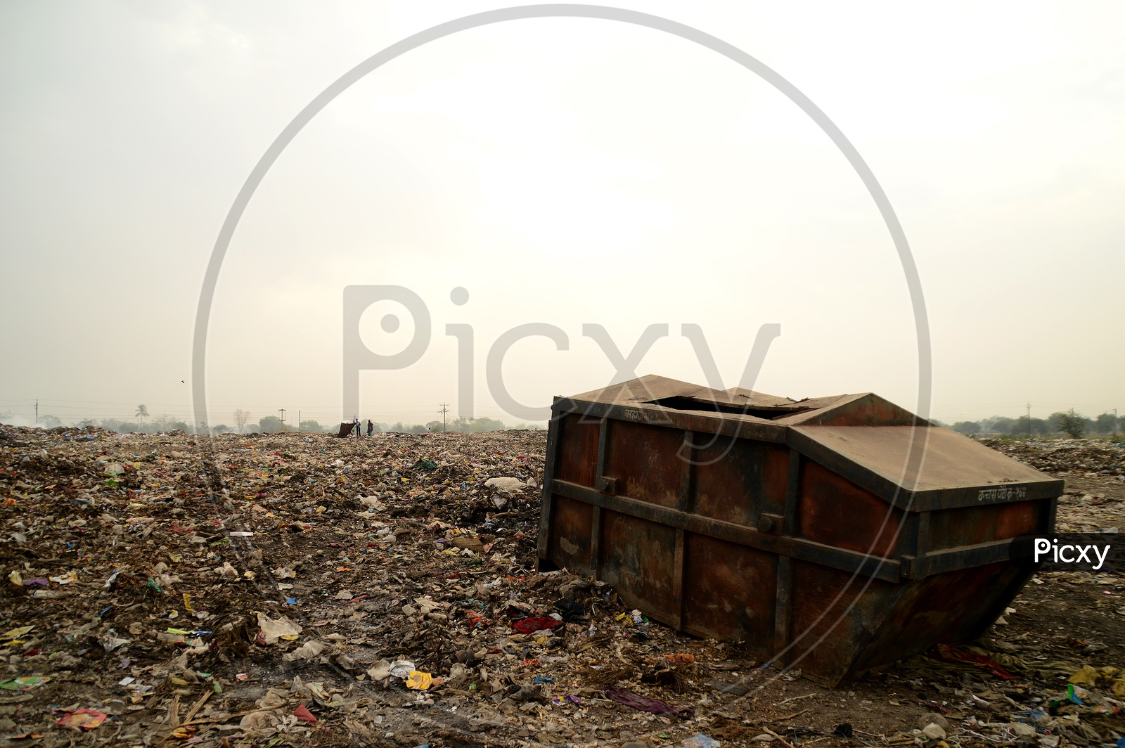Garbage Dumping Bin In a Dumping Yard
