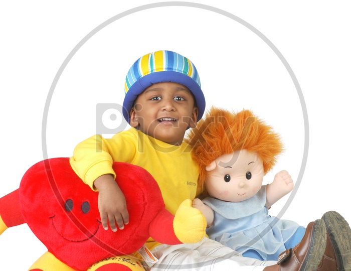 Indian boy playing with toys