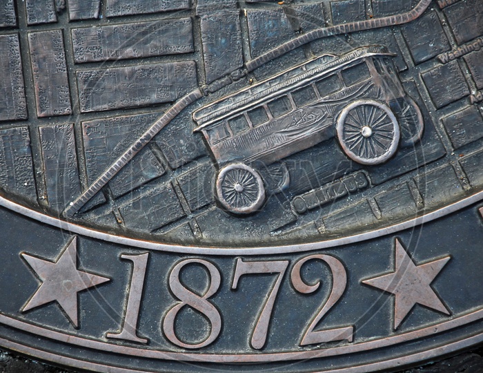 Number '1872' on metal surface