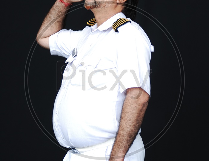 A Man dressed up in a Navy Costume