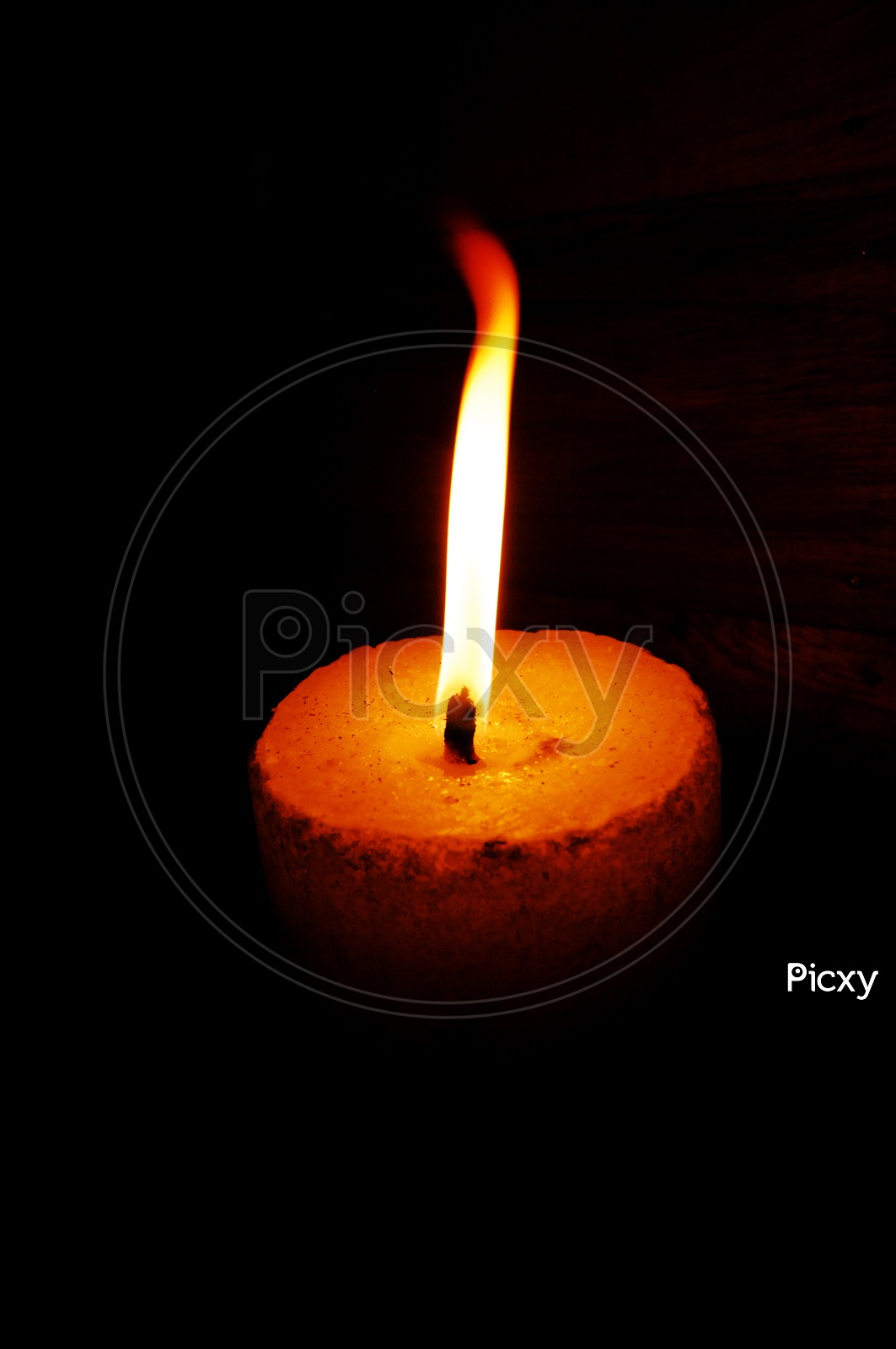 Wax Candle Lighted In  Dark