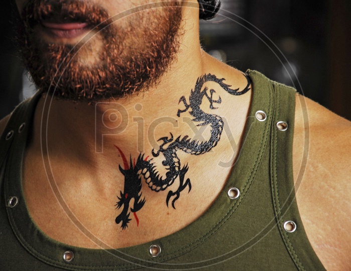 Dragon Tattoo On a Man Neck