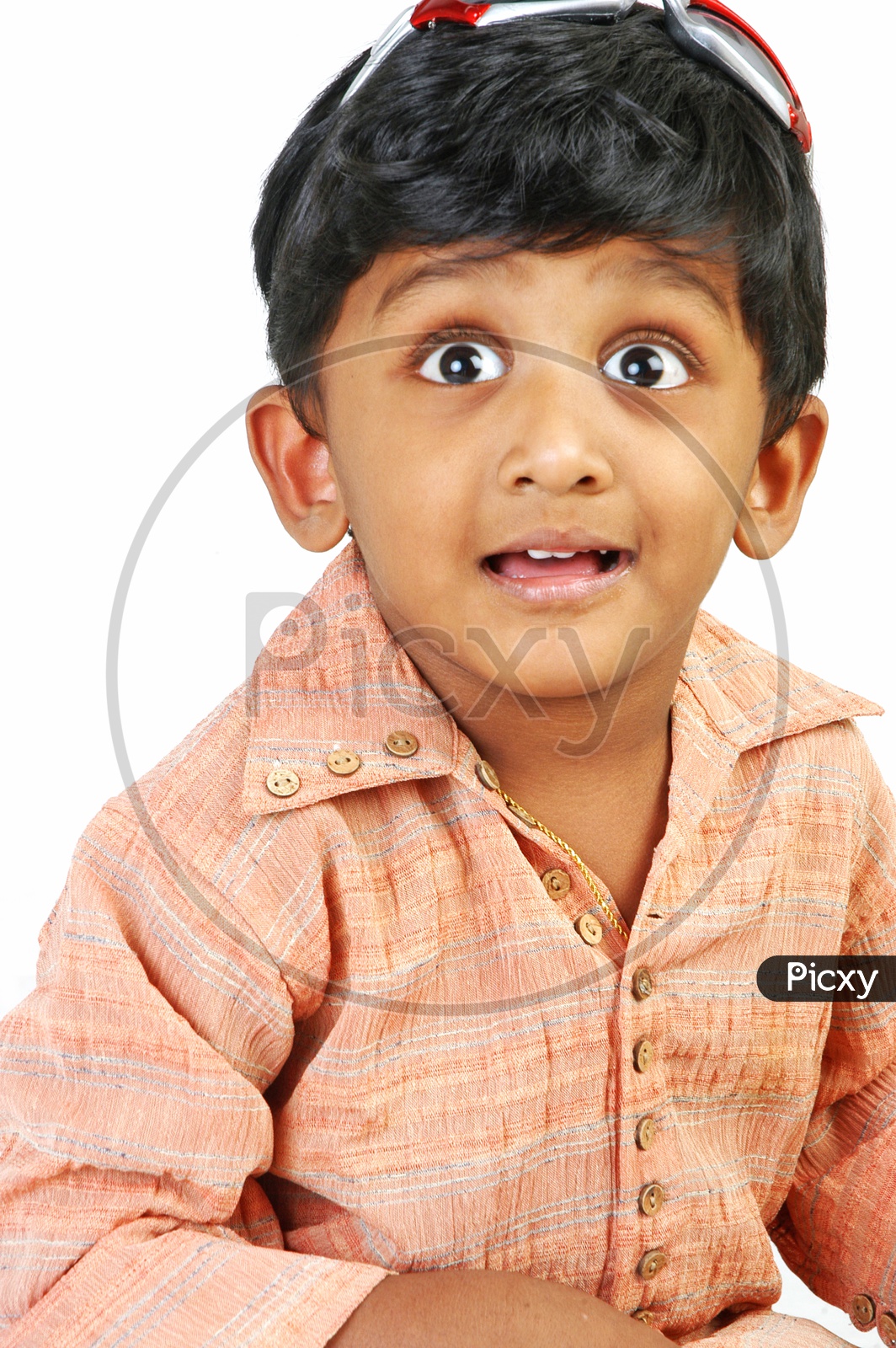 Indian boy in a surprised state of face