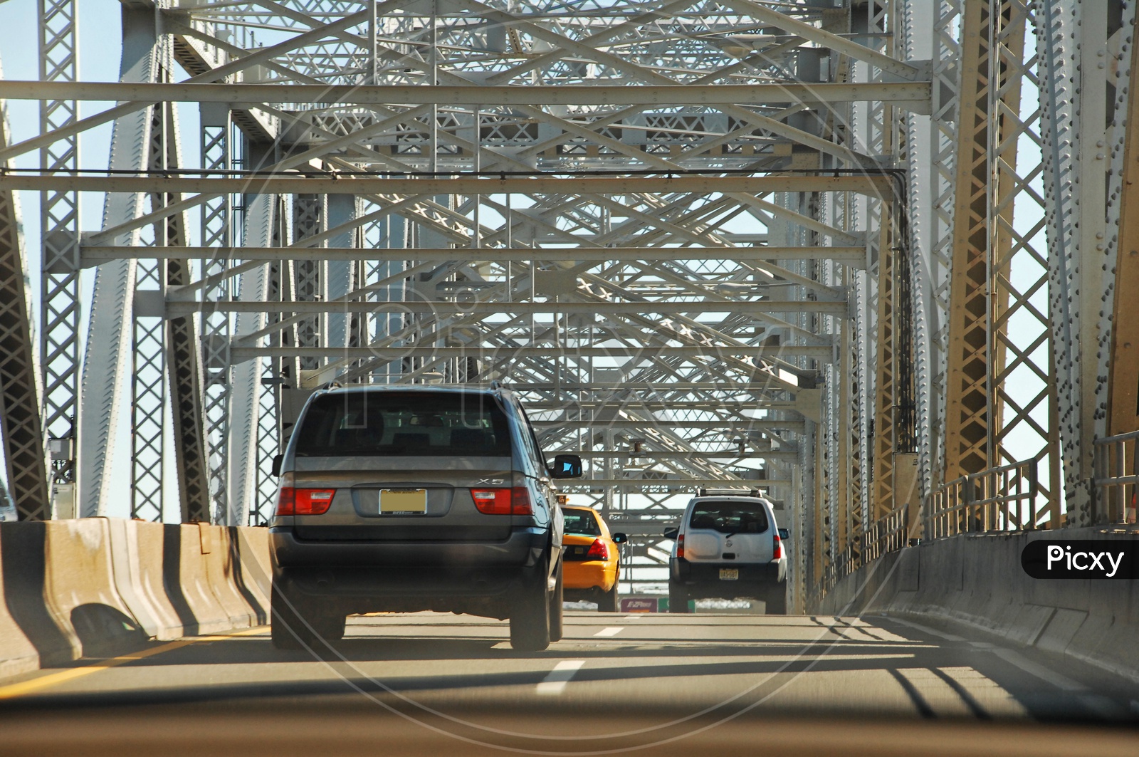 Moving cars on a bridge