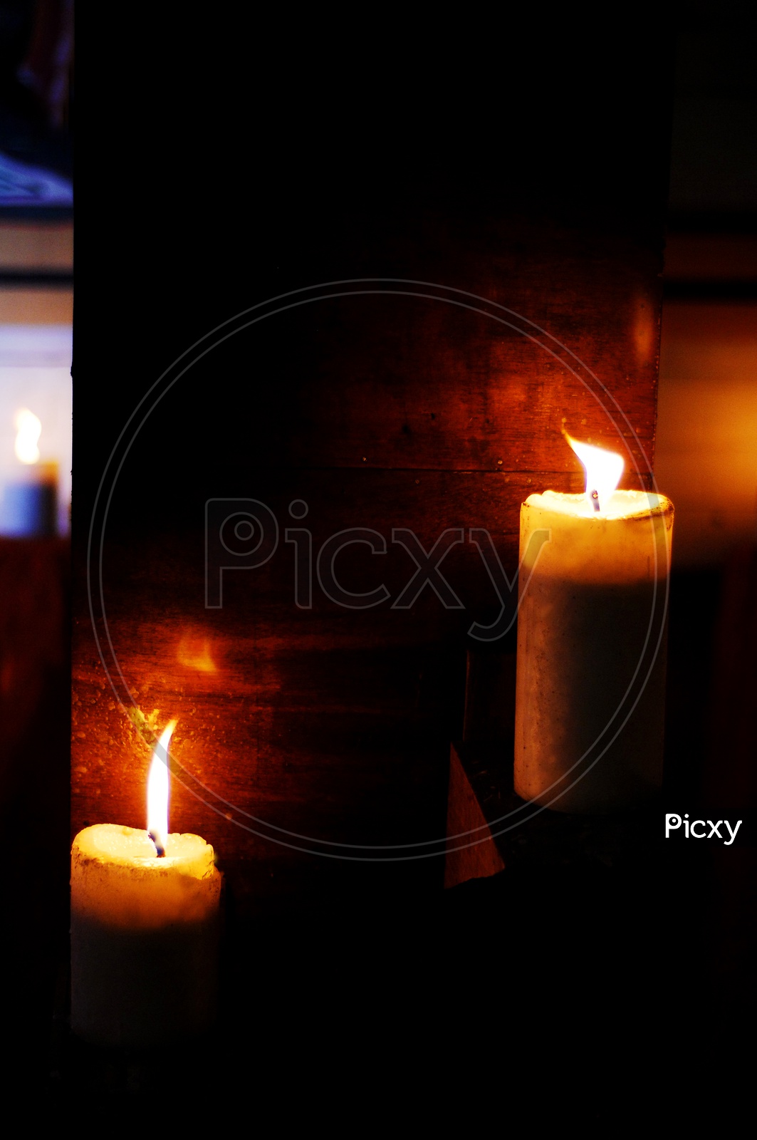 Wax candles Lighted In Dark
