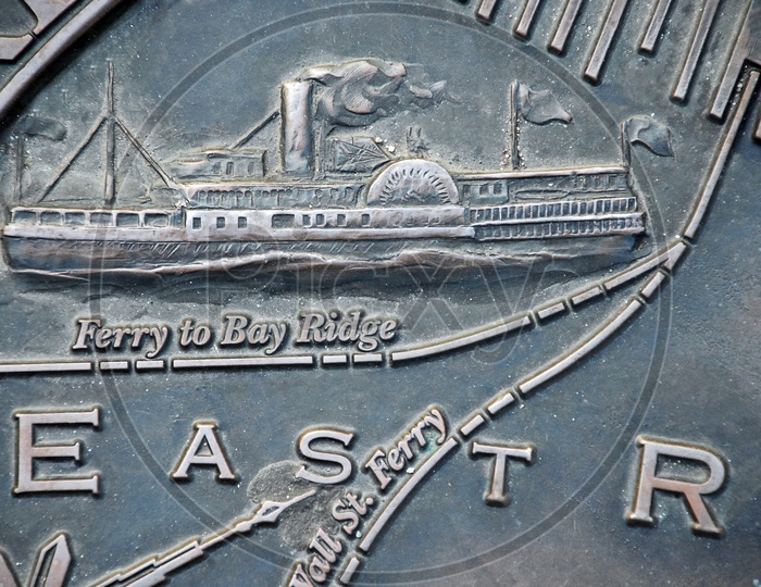 Illustration of a ferry embossed on a metal surface